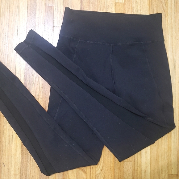 TNA Pants - TNA hi-rise leggings with mesh cut out in black size s